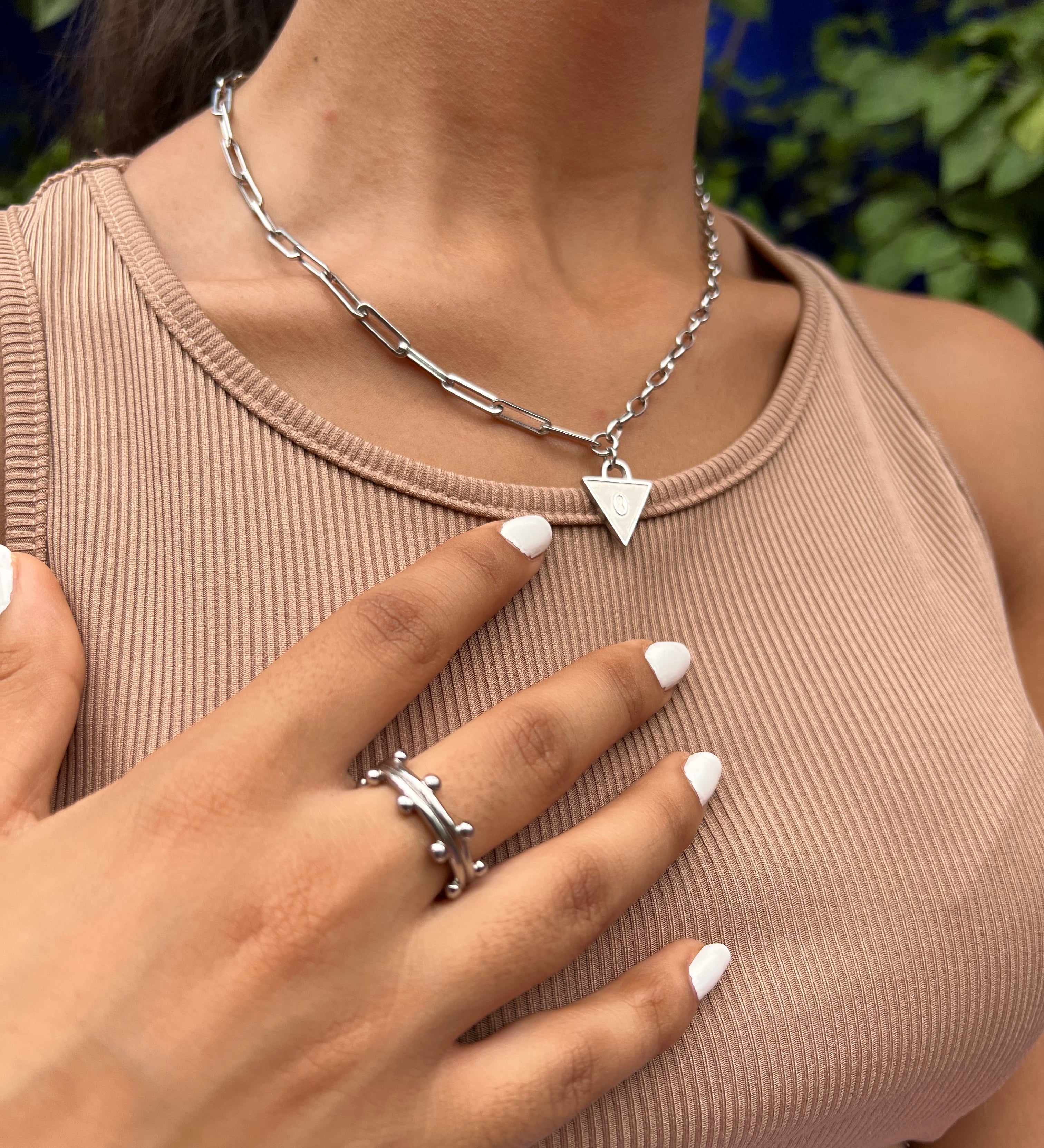 Female wearing Affirmation necklace in silver with booble ring in silver