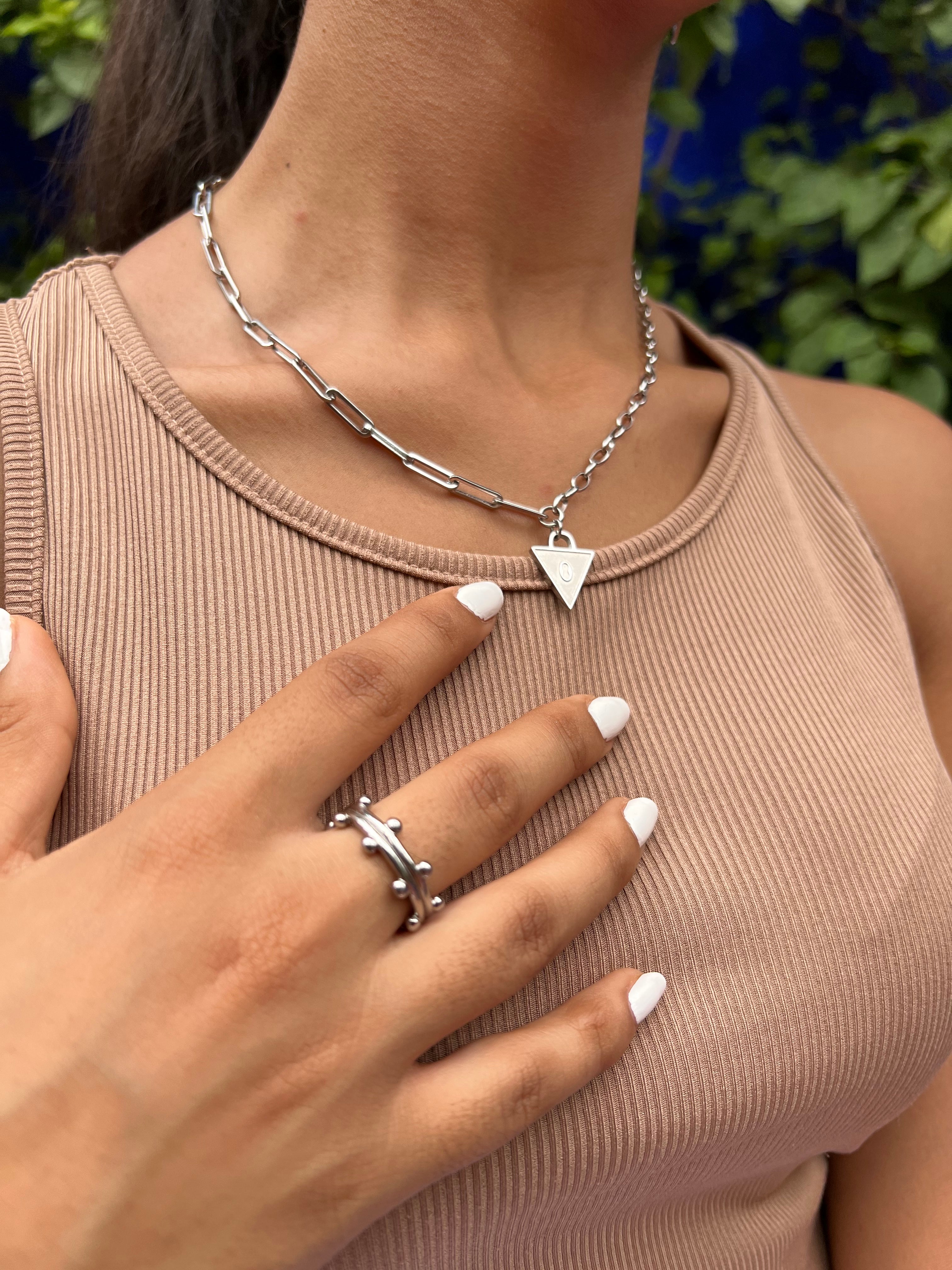 Female wearing Affirmation necklace in silver with booble ring in silver